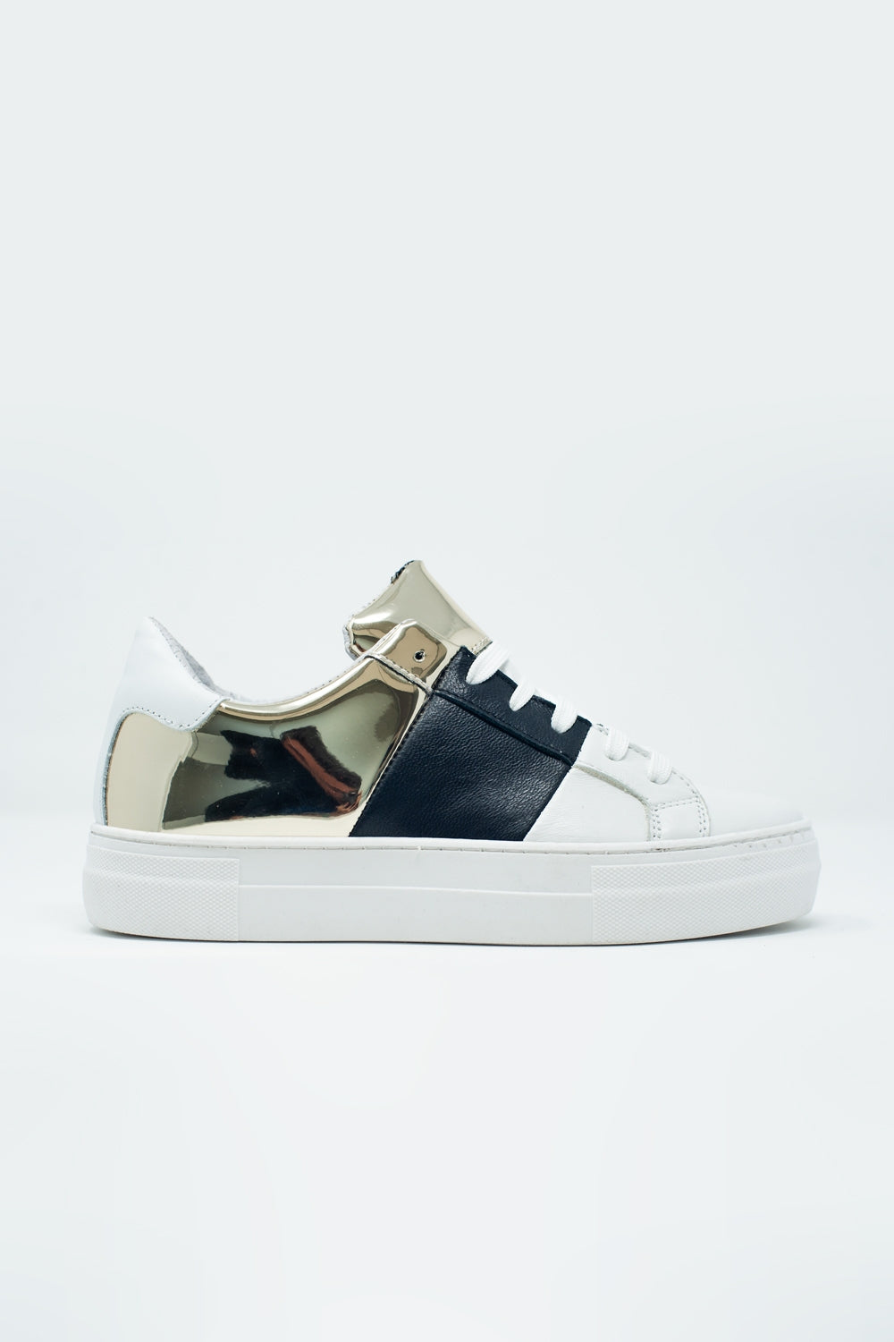 Chunky sneakers en negro y dorado