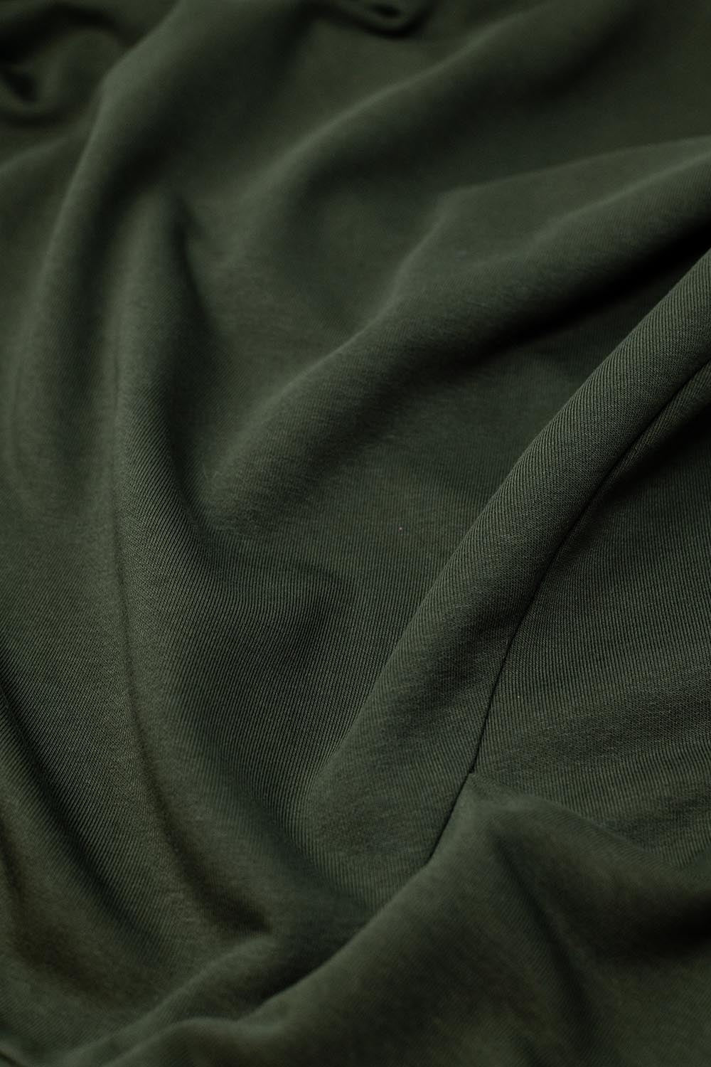 Cómodo jersey verde con cuello redondo