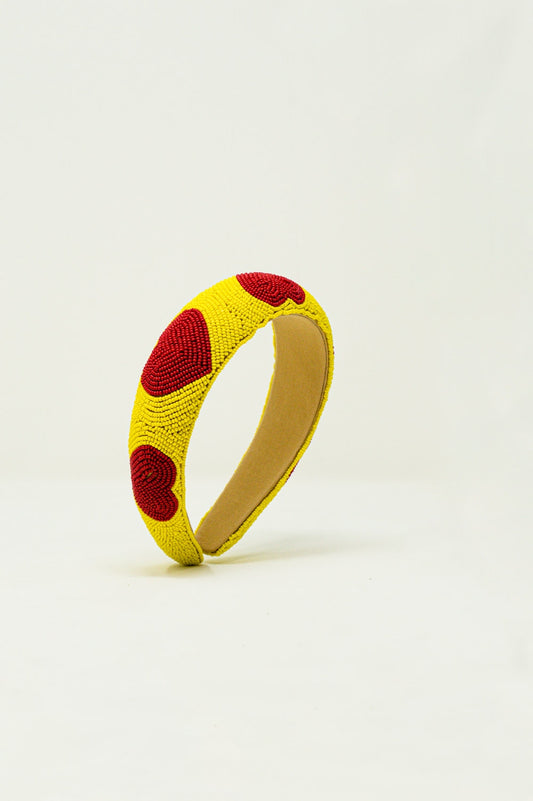 Q2 Diadema de cuentas con detalles de corazón en amarillo
