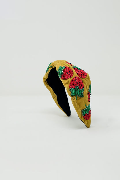 Diadema de terciopelo con adornos en forma de perlas en forma de fresa
