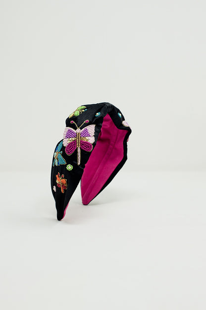 Q2 Diadema negra con mariposas y flores bordadas