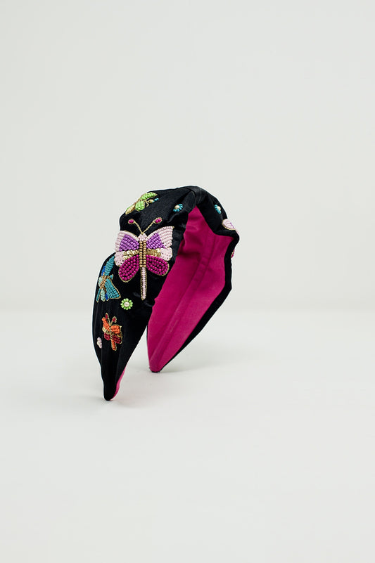 Q2 Diadema negra con mariposas y flores bordadas