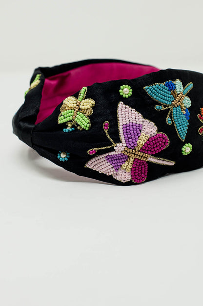 Diadema negra con mariposas y flores bordadas