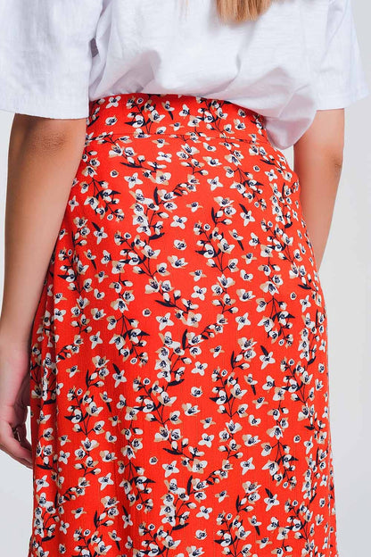 Falda roja asimétrica y cruzada con estampado