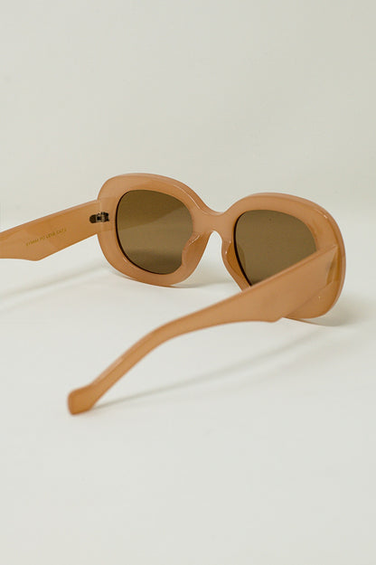Gafas de sol circulares de gran tamaño en color beige