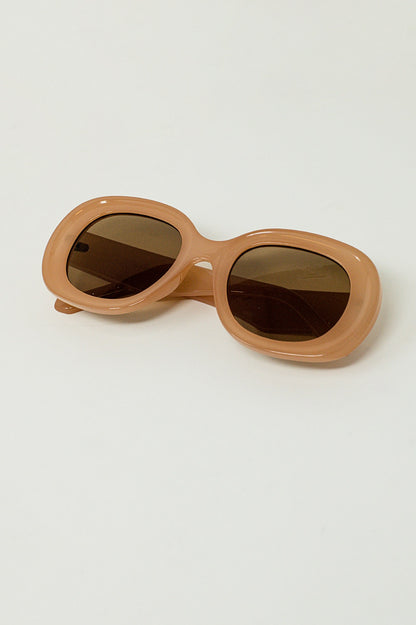 Gafas de sol circulares de gran tamaño en color beige