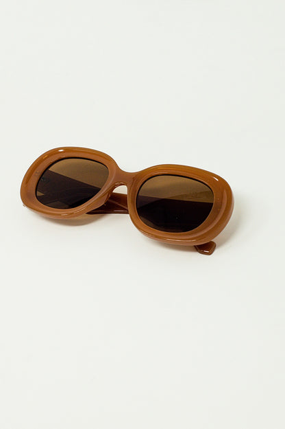 Gafas de sol circulares y grandes en marron