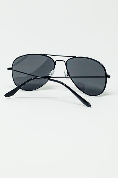 Gafas de sol de aviador retroCon cristales ahumados en negro