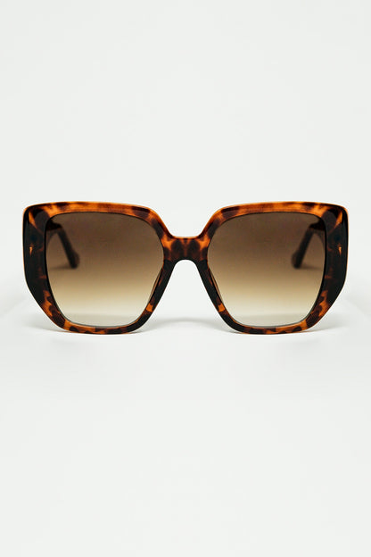 Q2 Gafas de sol marrones estilo pin-up con diseño geométrico y ojos de gato