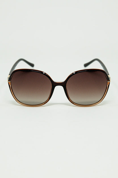 Q2 Gafas de sol redondas en color caramelo con detalle metálico dorado