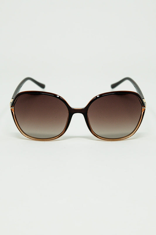 Q2 Gafas de sol redondas en color caramelo con detalle metálico dorado