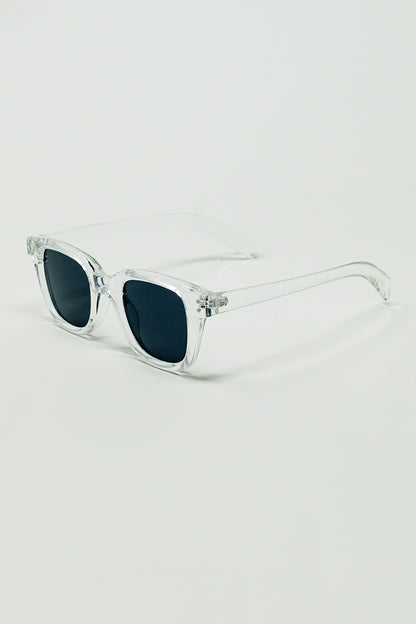 Gafas de sol retro redondas con lentes ahumadas negras y montura transparente