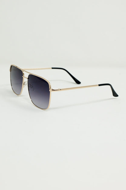 Gafas de sol vintage de aviador con montura dorada