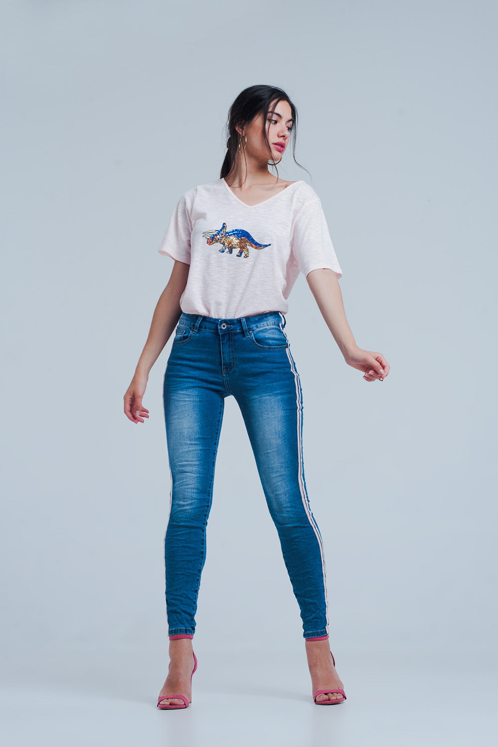 Jeans ajustados con rayas laterales en color rosa