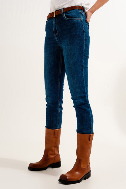 Jeans ajustados de talle alto en azul oscuro con elástico de alta calidad