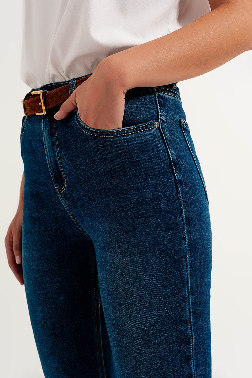 Jeans ajustados de talle alto en azul oscuro con elástico de alta calidad