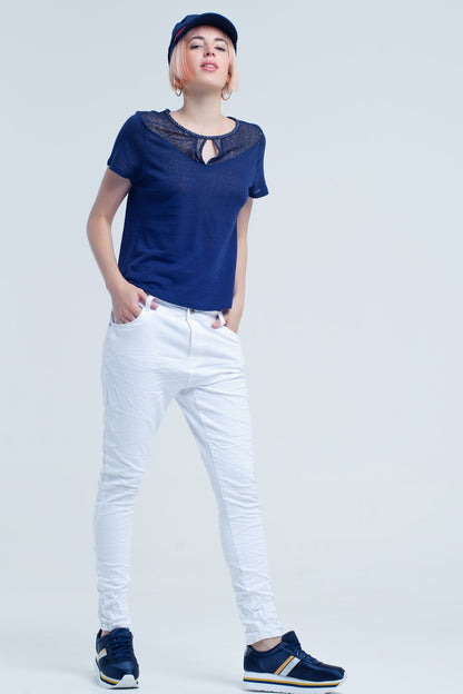 Jeans blancos arrugado con bolsillos