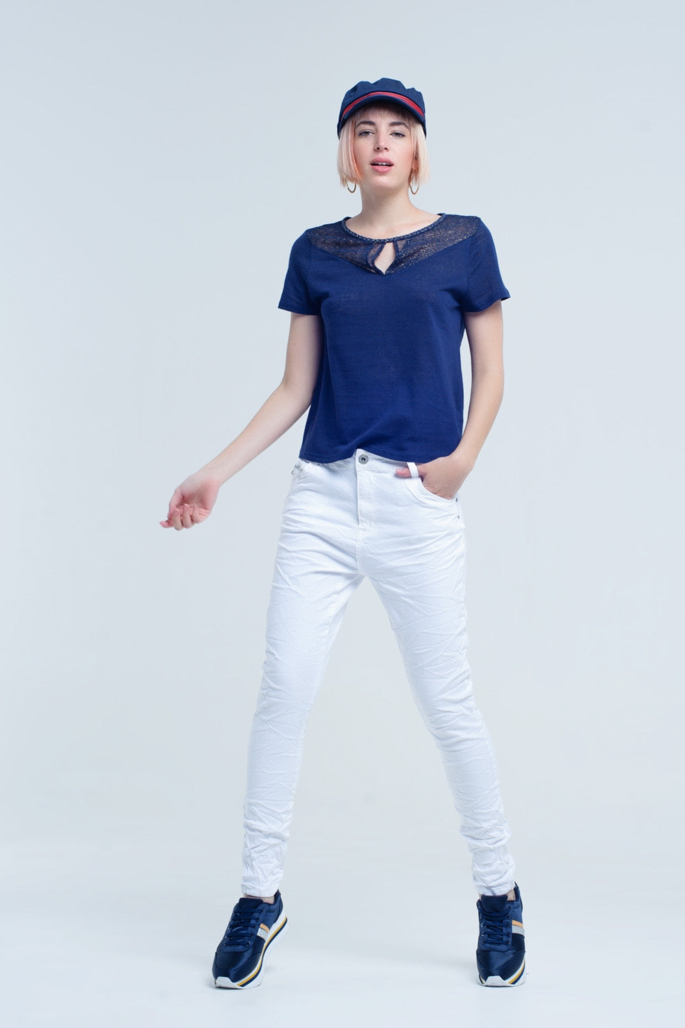 Jeans blancos arrugado con bolsillos