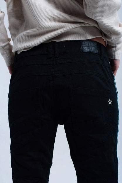 Jeans boyfriend negros con botones
