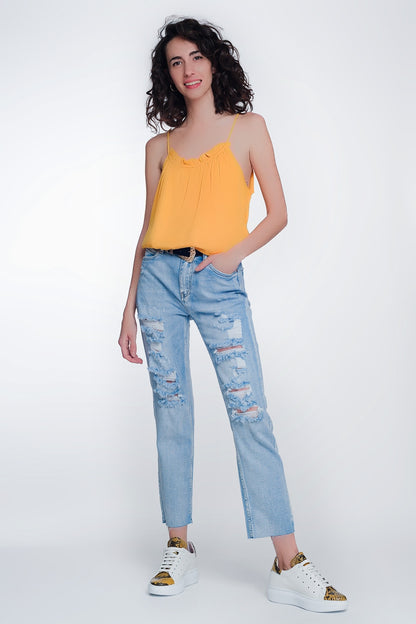 Jeans capri de pernera ancha con bajos sin rematar en azul claro