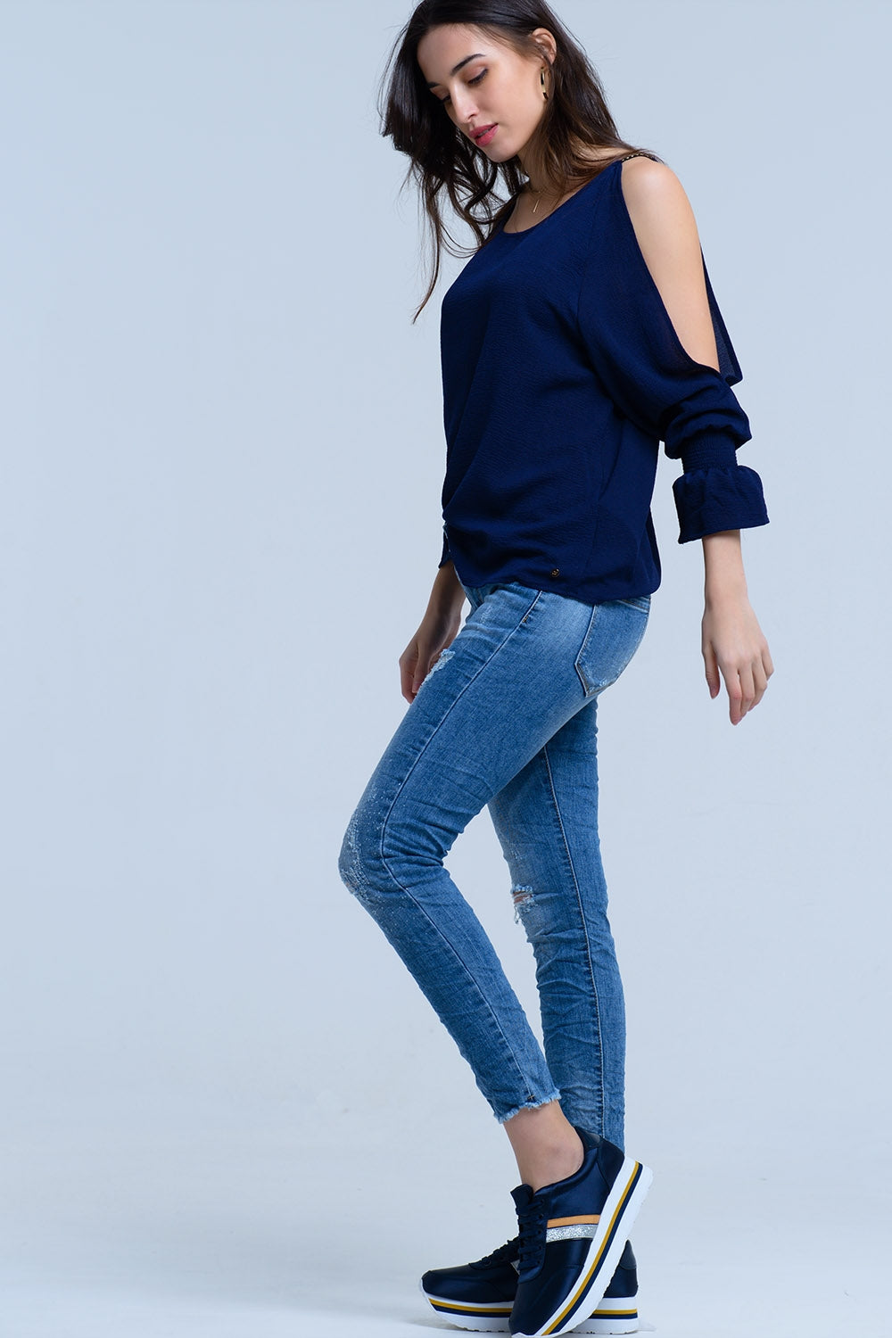 Jeans con detalle de roturas