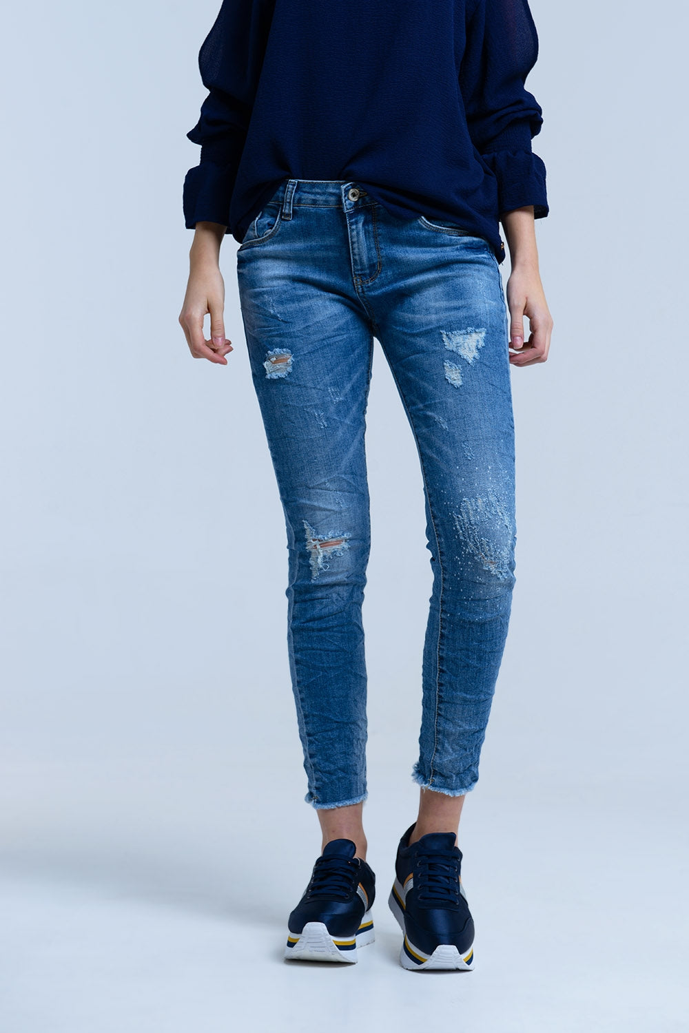 Jeans con detalle de roturas