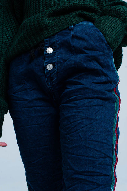 Jeans jogger con raya lateral granate y verde
