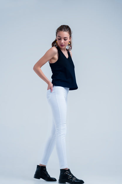 Jeggings blancos con bolsillos traseros