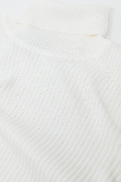 Jersey básico crema de canalé con cuello alto
