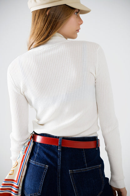 Jersey básico crema de canalé con cuello alto