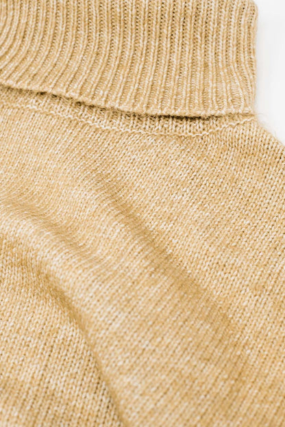 Jersey beige de cuello alto y mangas caídas