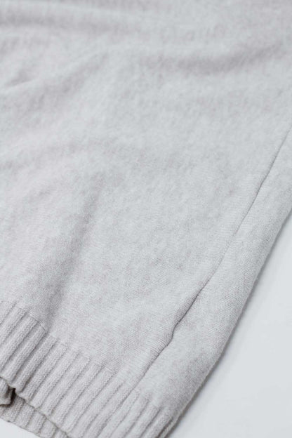 Jersey beige holgado con mangas ajustadas