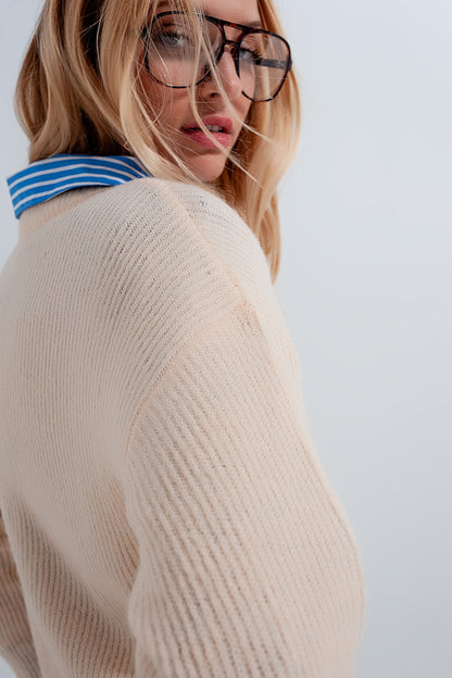 Jersey con cuello redondo color beige
