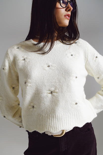 Jersey con flores tejidas y adornado con strass en crudo