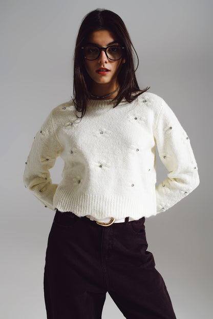 Jersey con flores tejidas y adornado con strass en crudo