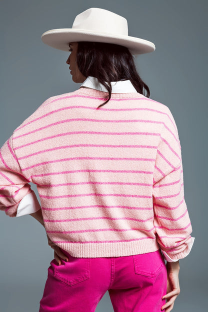 Jersey con hombros caídos y rayas fucsia