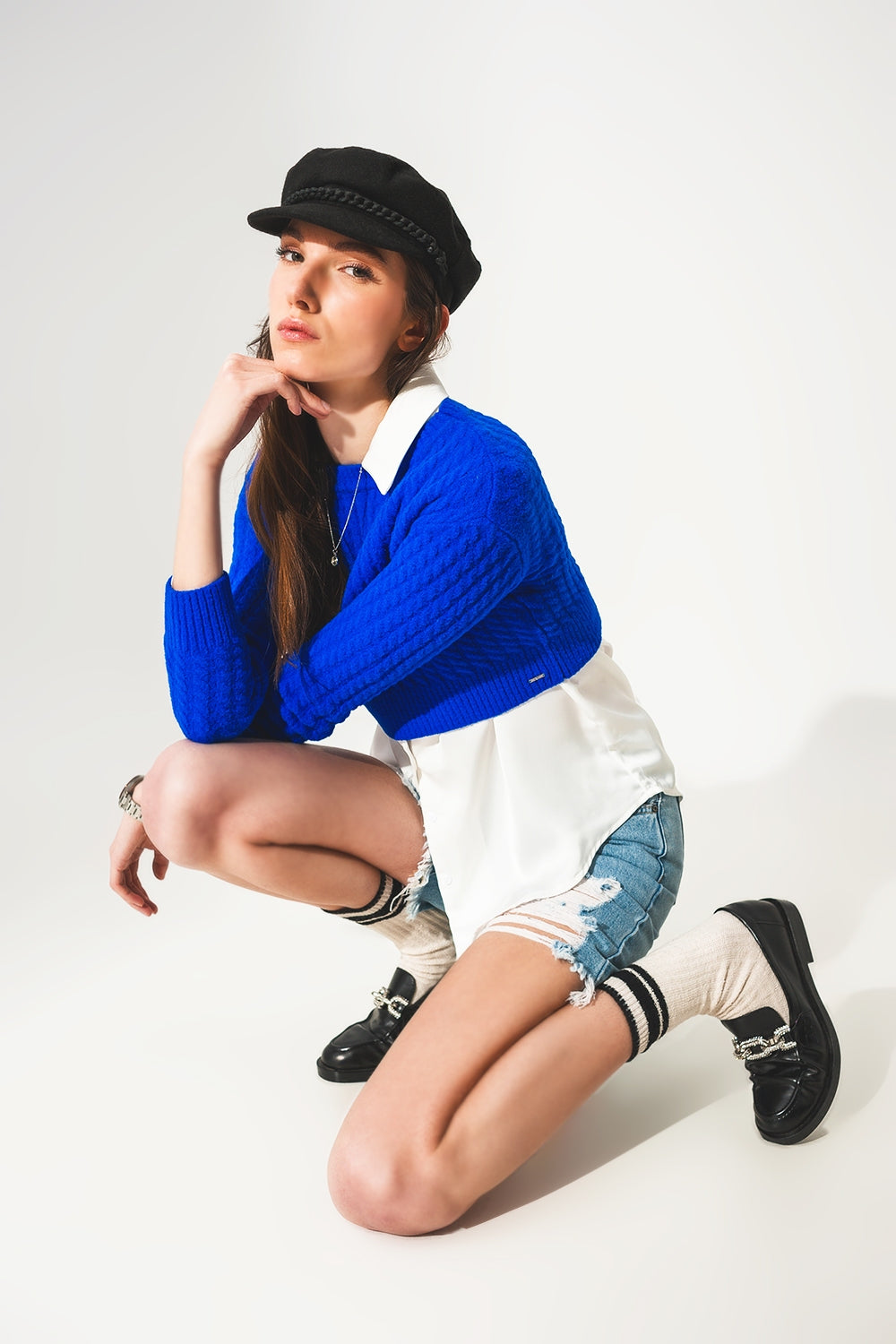 Jersey corto azul con diseño trenzado