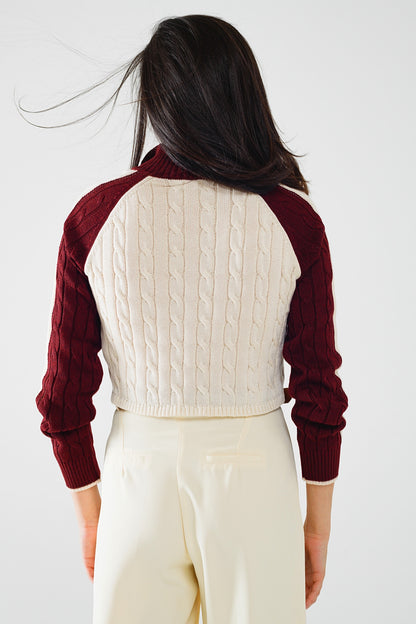 jersey corto blanco y burdeos con cremallera en el cuello