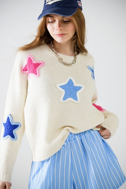 Jersey crema con estrellas bordadas