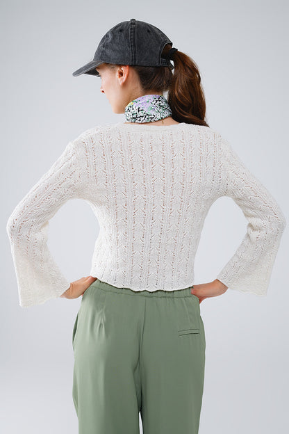 Jersey crema con mangas acampanadas