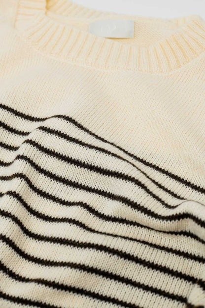 Jersey crema con rayas marrones y cuello barco