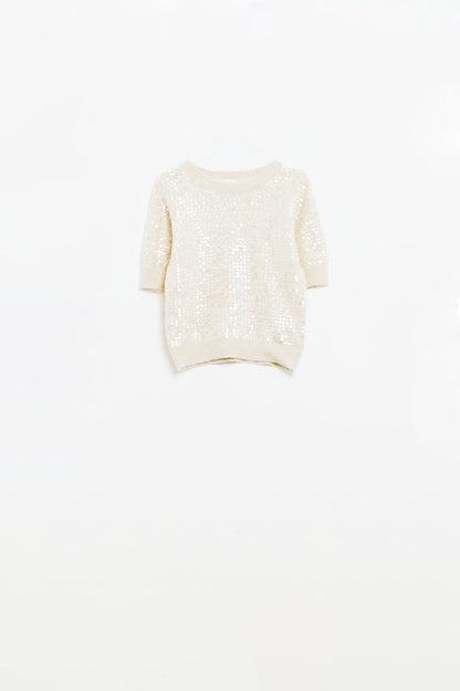 Jersey crema de lentejuelas y manga corta