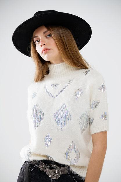 Jersey crema de manga corta con adorno de lentejuelas