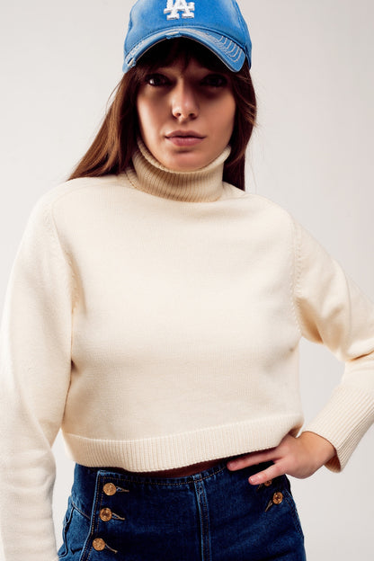 Jersey cropped de cuello alto en crema