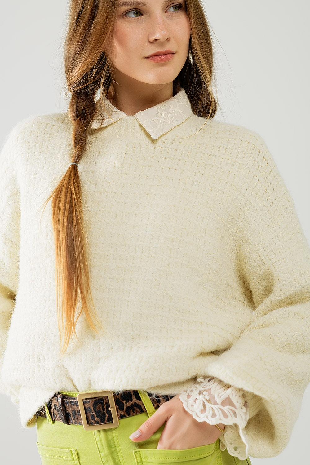 Jersey de punto beige con mangas globo