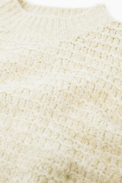 Jersey de punto beige con mangas globo