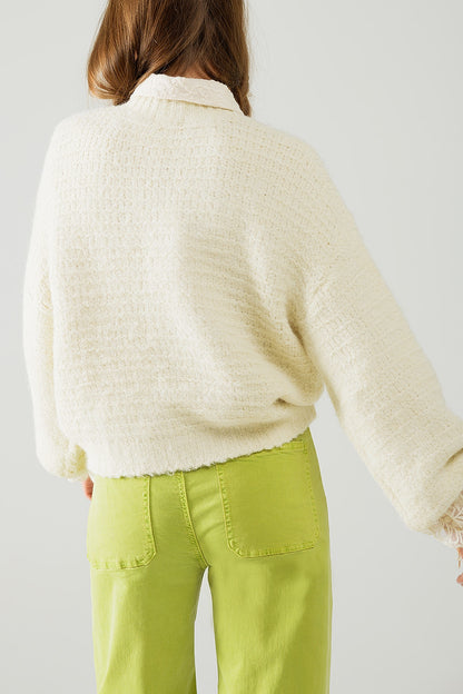 Jersey de punto beige con mangas globo