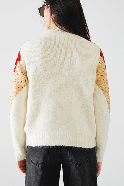 jersey de punto de color burdeos y beige con adorno de lentejuelas