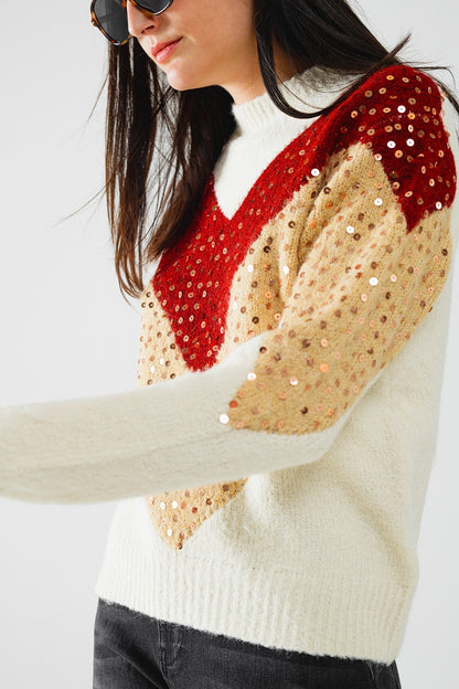 jersey de punto de color burdeos y beige con adorno de lentejuelas