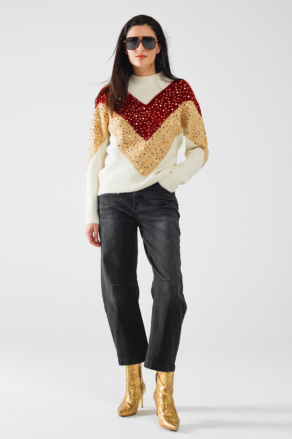 jersey de punto de color burdeos y beige con adorno de lentejuelas